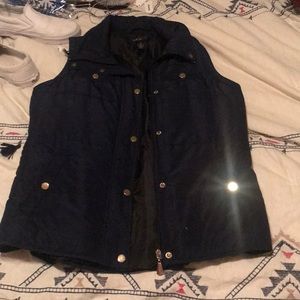 navy blue puffer vest